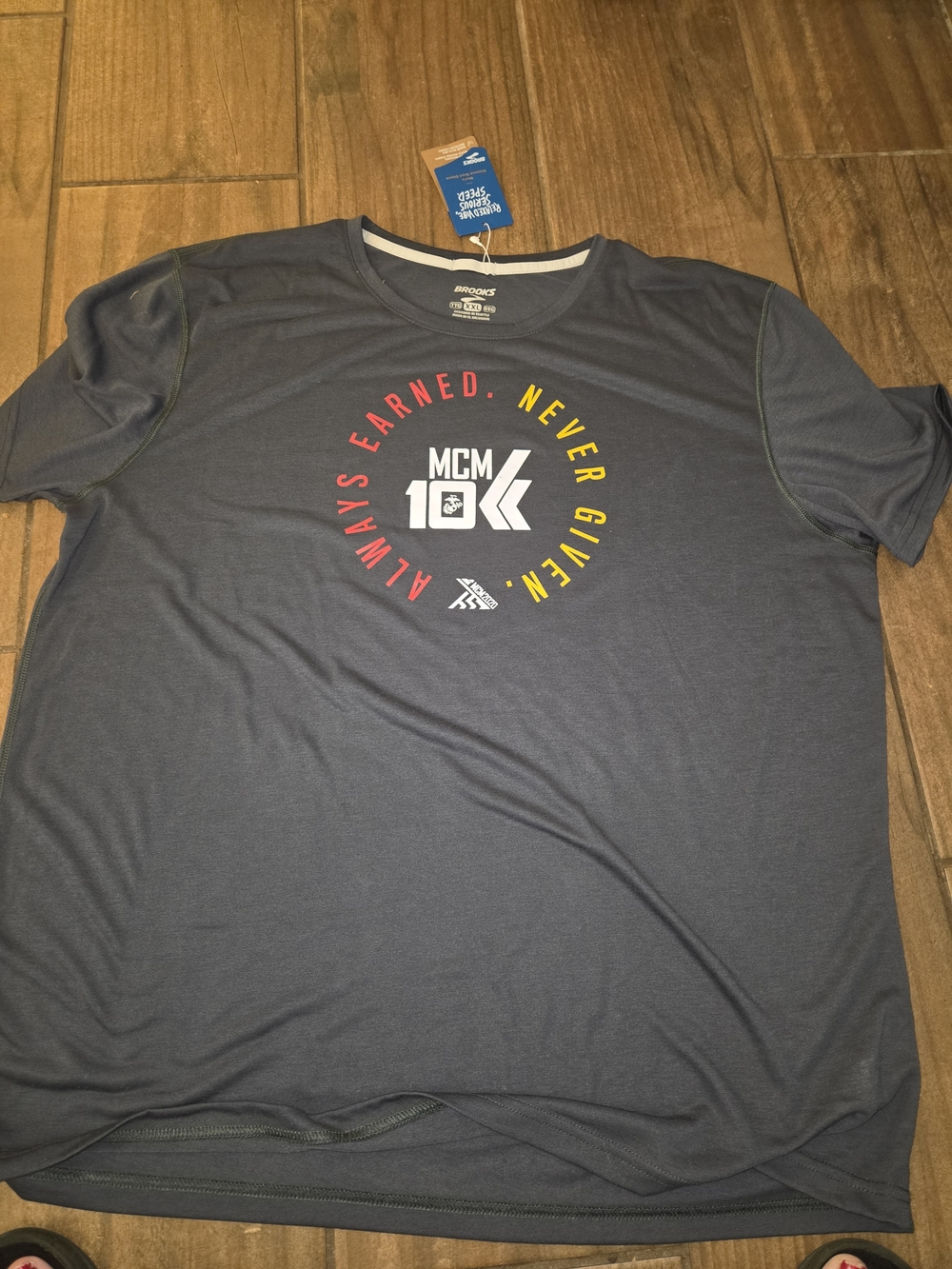 Brooks Navy Short-Sleeve 10K Graphic Tee with Red & Yellow Accents